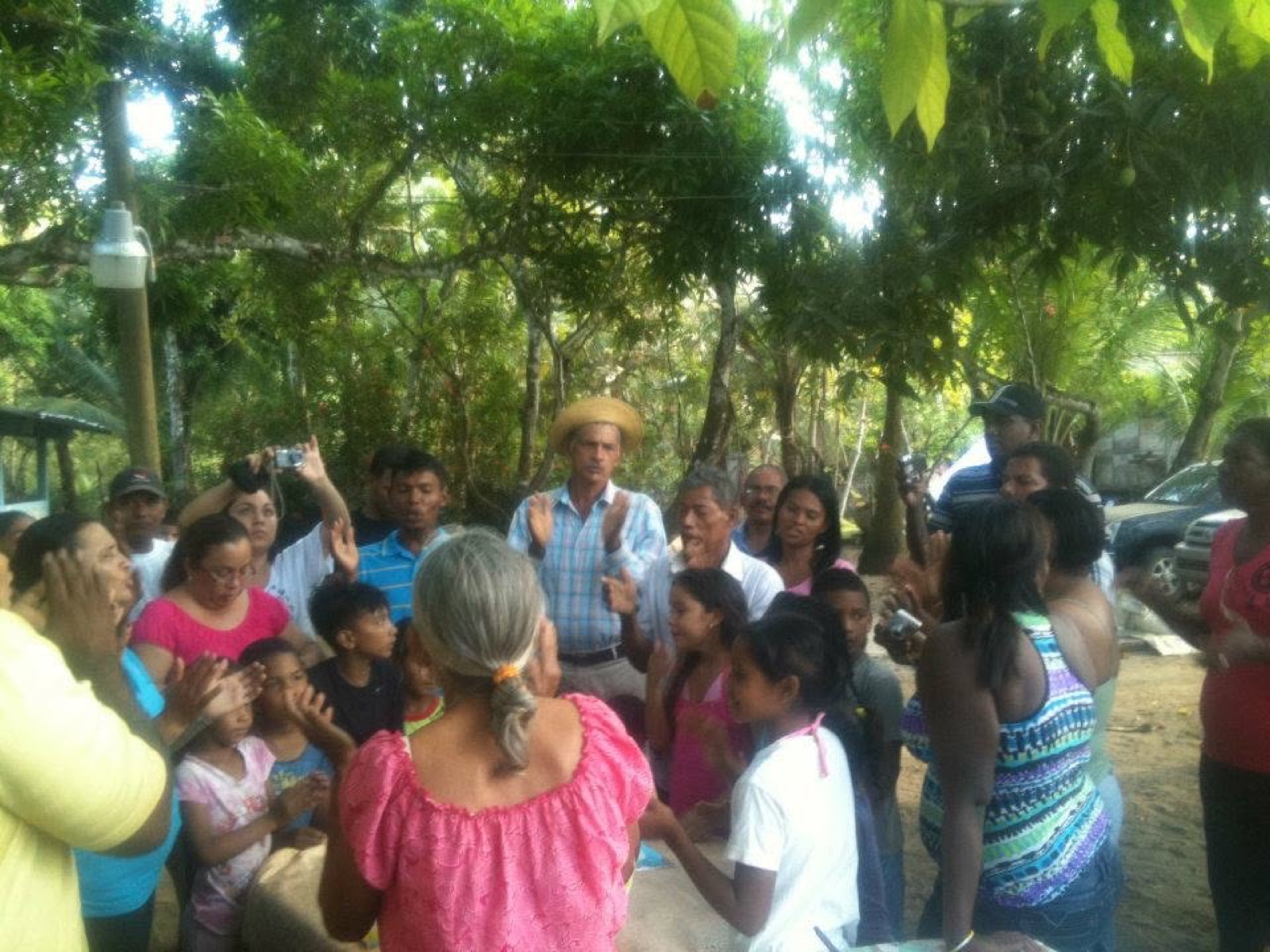 Community members and local coordinators meeting in rural Panama