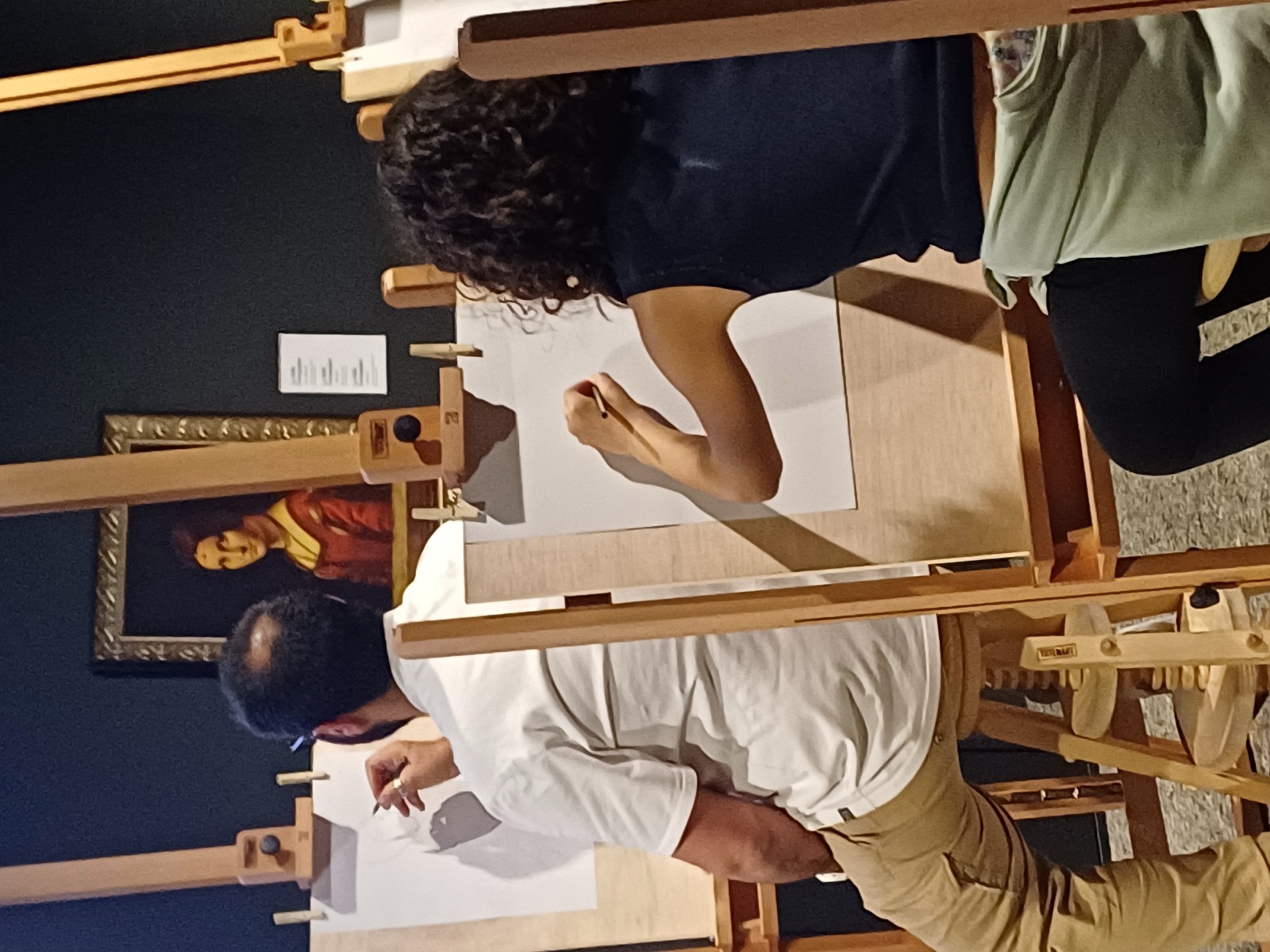 Participants developing practical skills through a guided art activity